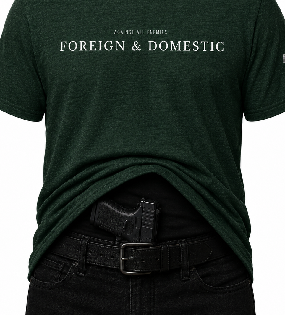 Dark green t-shirt with 'FOREIGN & DOMESTIC' text on a white background